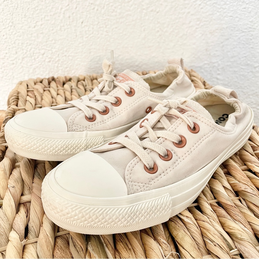 Converse Low Top Sneakers in Light Beige with Rose Gold Eyelets